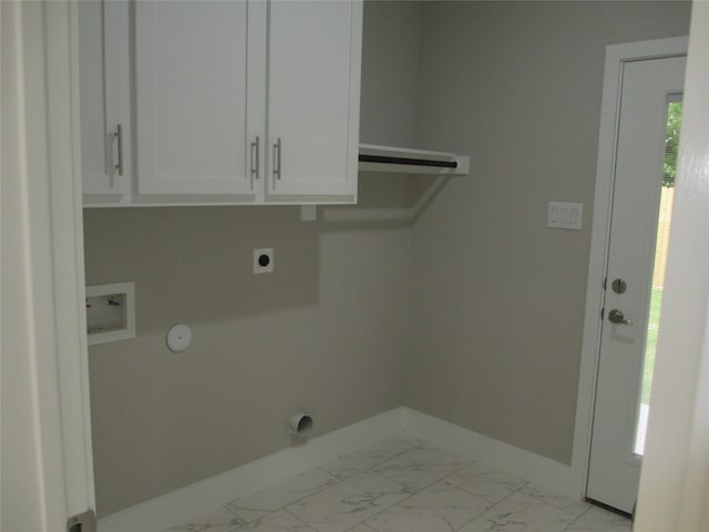 721 E Fayle St, Baytown, TX 77520 - laundry room featuring cabinet space, marble finish floor, hookup for an electric dryer, baseboards, and hookup for a washing machine
