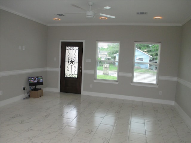 721 E Fayle St, Baytown, TX 77520 - foyer entrance with a ceiling fan, a wealth of natural light, baseboards, and visible vents