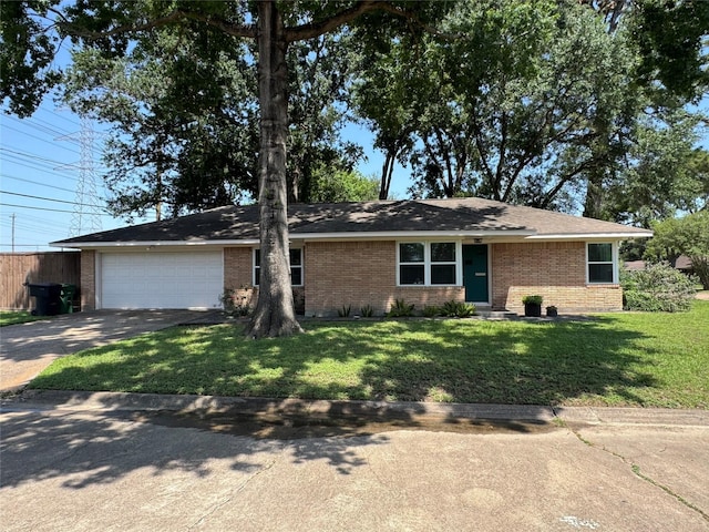 ranch-style house featuring brick siding, driveway, a garage, a front lawn, and a shingled roof