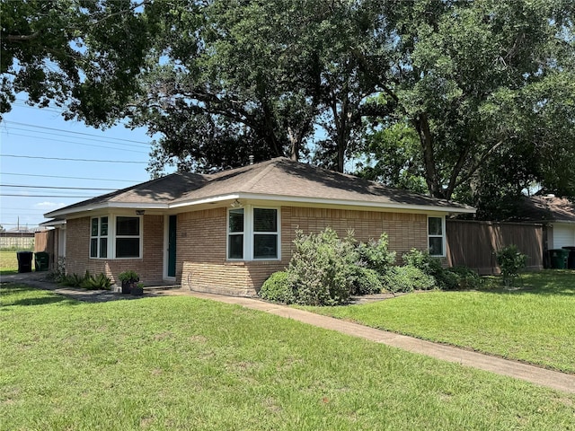 view of front of house with brick siding