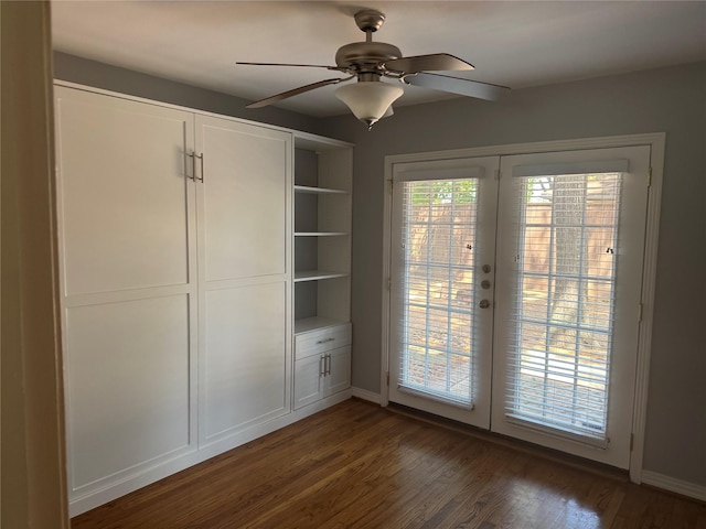 unfurnished bedroom with access to exterior, french doors, wood finished floors, baseboards, and a ceiling fan