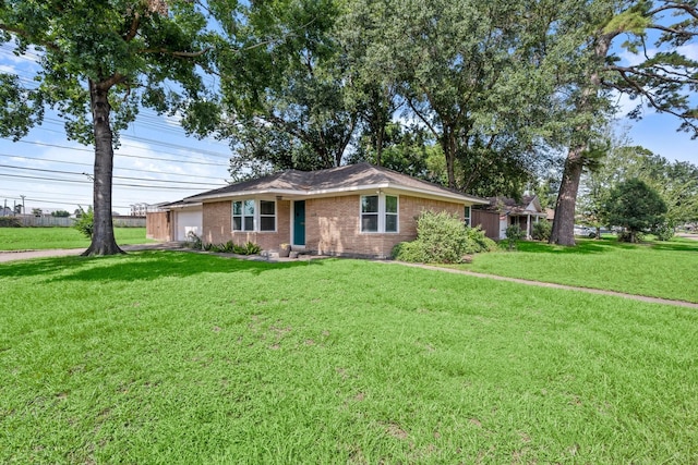 2218 Stonecrest, Houston, TX 77018 - single story home featuring a front yard, brick siding, and a garage