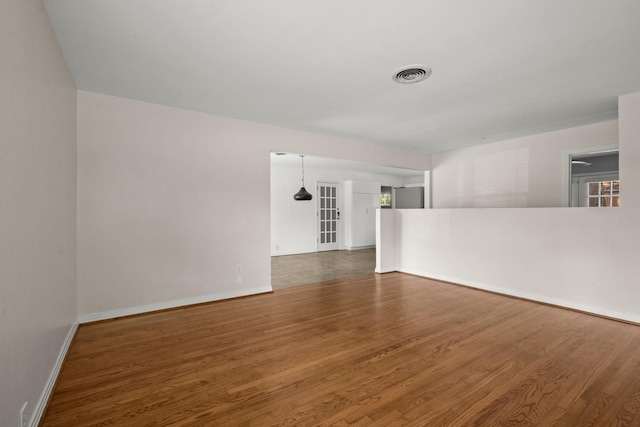 2218 Stonecrest, Houston, TX 77018 - spare room featuring wood finished floors and baseboards