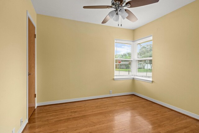 2218 Stonecrest, Houston, TX 77018 - unfurnished room with light wood-style floors, baseboards, and a ceiling fan