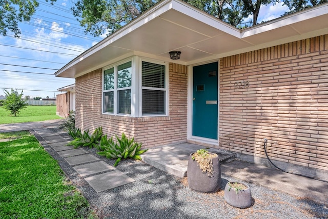 2218 Stonecrest, Houston, TX 77018 - entrance to property with brick siding and a yard