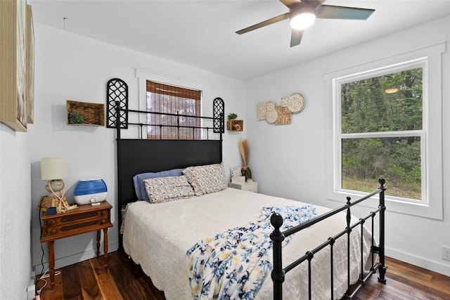 452 N Ghost Branch Rd, Trinity, TX 75862 - bedroom featuring a ceiling fan, wood finished floors, and baseboards