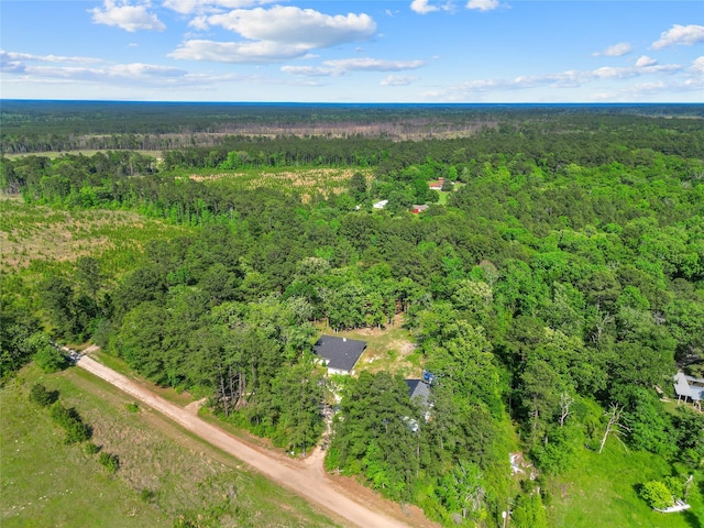 452 N Ghost Branch Rd, Trinity, TX 75862 - drone / aerial view with a wooded view
