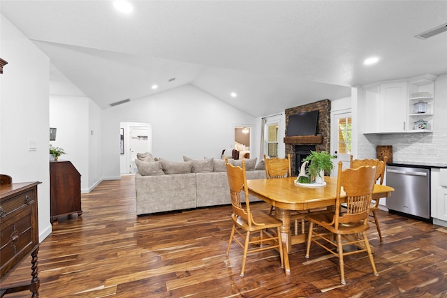 452 N Ghost Branch Rd, Trinity, TX 75862 - dining space with lofted ceiling, dark wood-type flooring, visible vents, and recessed lighting