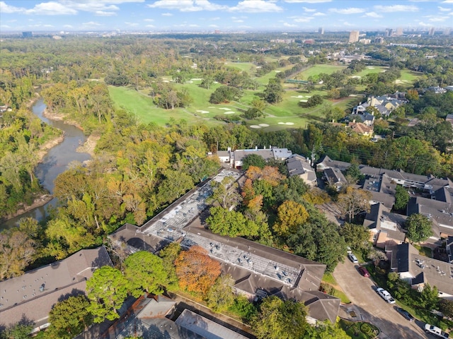 bird's eye view with a water view and view of golf course