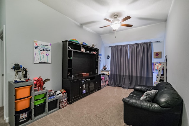 living room with ceiling fan and carpet flooring