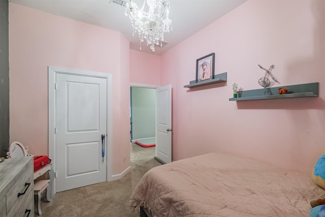 bedroom featuring an inviting chandelier, carpet floors, and baseboards