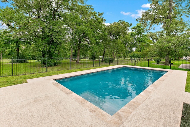 view of pool featuring a yard, fence, a patio, and a fenced in pool
