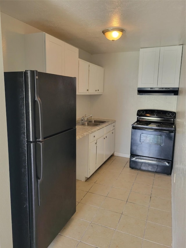 kitchen featuring a sink, black appliances, under cabinet range hood, light countertops, and light tile patterned floors