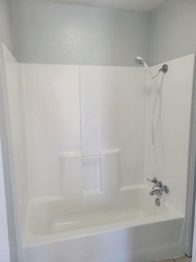bathroom featuring bathtub / shower combination