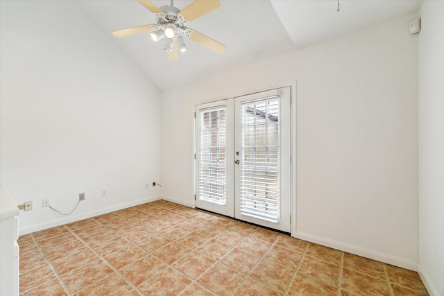 spare room featuring vaulted ceiling, baseboards, french doors, and a ceiling fan