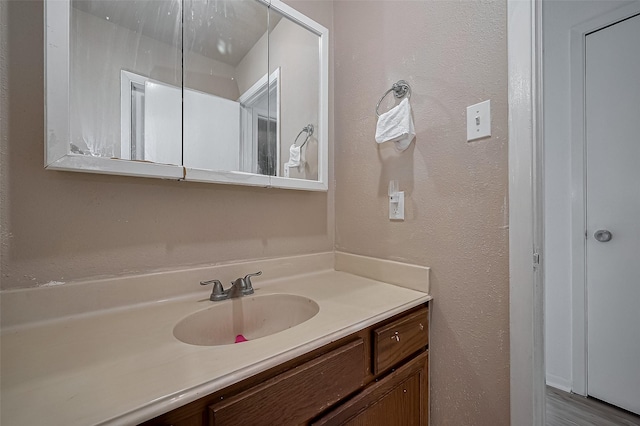 9009 Richmond Ave Unit 613, Houston, TX 77063 - bathroom featuring vanity