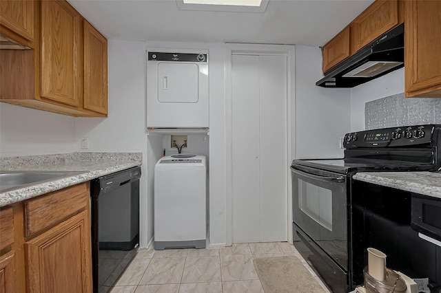 9009 Richmond Ave Unit 613, Houston, TX 77063 - kitchen featuring black appliances, under cabinet range hood, brown cabinets, and light countertops