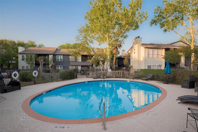 9009 Richmond Ave Unit 613, Houston, TX 77063 - community pool featuring fence and a patio area