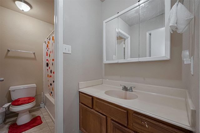 9009 Richmond Ave Unit 613, Houston, TX 77063 - bathroom with toilet, vanity, shower / bath combo, and tile patterned flooring