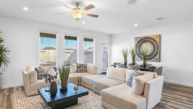 3119 Crown Gate Dr, Houston, TX 77047 - living area featuring wood finished floors, visible vents, recessed lighting, a ceiling fan, and baseboards