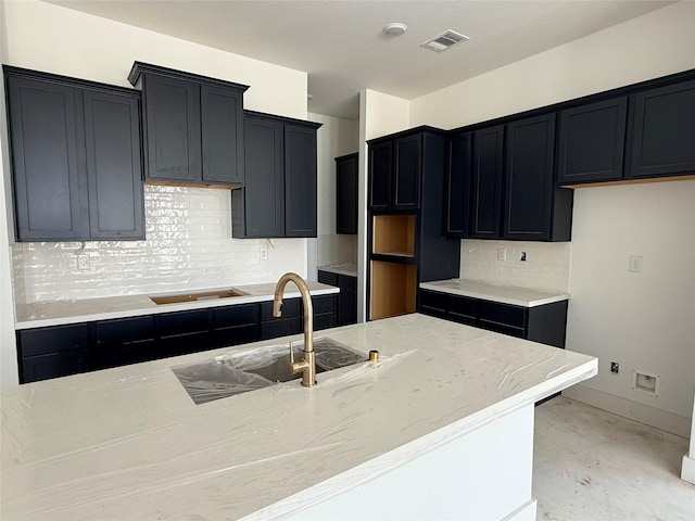 6126 Severson Lk, Katy, TX 77493 - kitchen with black electric cooktop, backsplash, visible vents, and a sink