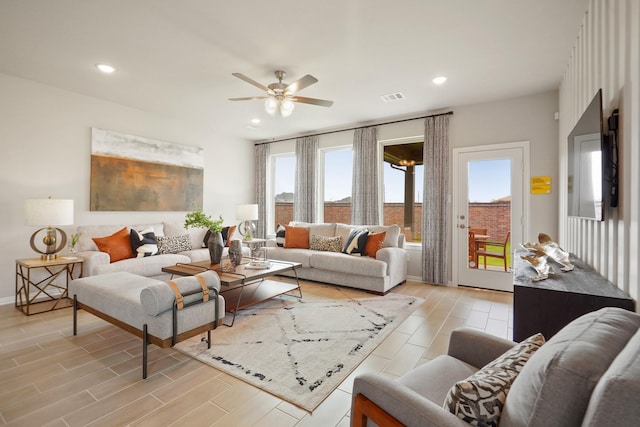 6126 Severson Lk, Katy, TX 77493 - living room featuring visible vents, recessed lighting, ceiling fan, light wood-style flooring, and baseboards