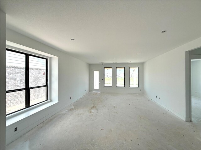 6126 Severson Lk, Katy, TX 77493 - empty room featuring unfinished concrete flooring