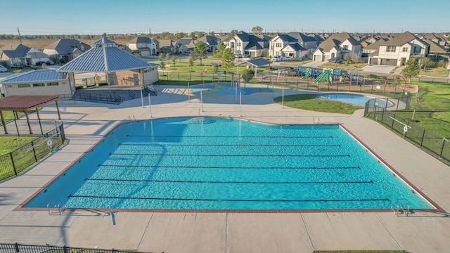 6126 Severson Lk, Katy, TX 77493 - pool with a gazebo, a patio, a residential view, and fence
