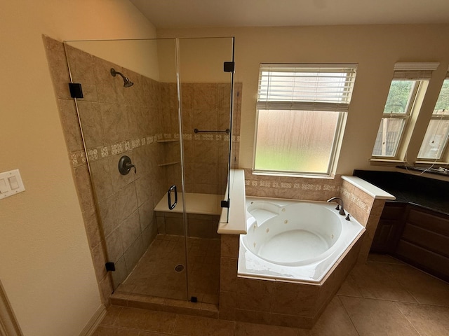4315 Sanctuary Hills Ct, Spring, TX 77388 - bathroom with a tub with jets, tile patterned floors, vanity, and a shower stall