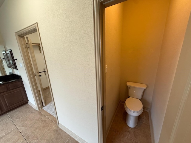 4315 Sanctuary Hills Ct, Spring, TX 77388 - bathroom featuring tile patterned floors, toilet, and vanity