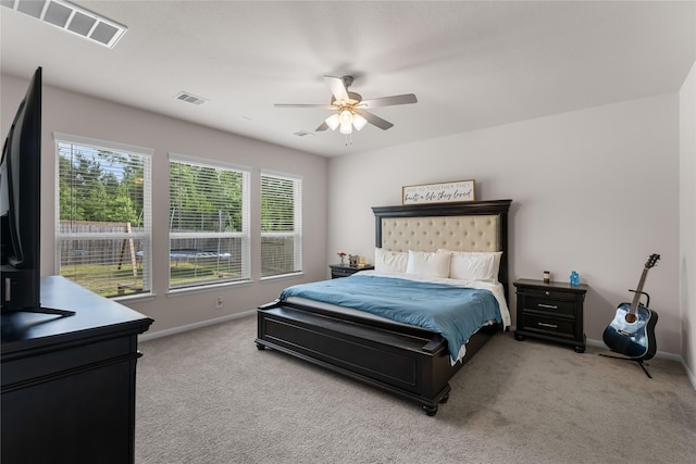 1226 Tilia Creek Ln, Montgomery, TX 77316 - bedroom with light colored carpet, baseboards, and ceiling fan