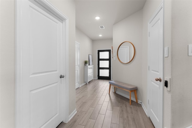 1226 Tilia Creek Ln, Montgomery, TX 77316 - hall featuring baseboards, light wood-style flooring, and recessed lighting