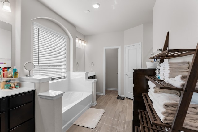 1226 Tilia Creek Ln, Montgomery, TX 77316 - full bath with a bath, vanity, and baseboards