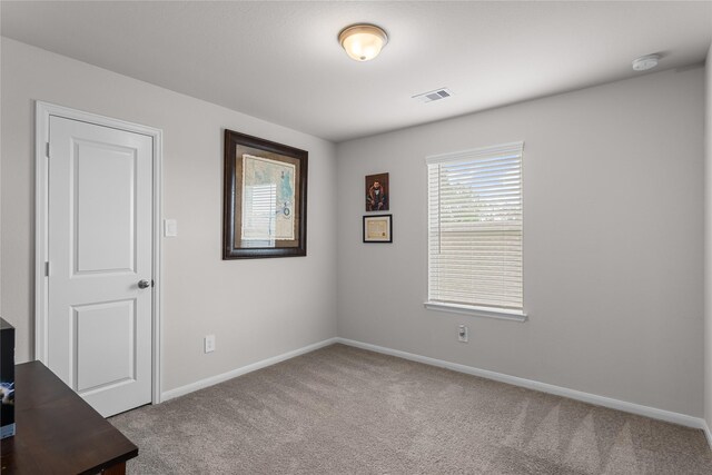 1226 Tilia Creek Ln, Montgomery, TX 77316 - carpeted empty room featuring baseboards and a smoke detector