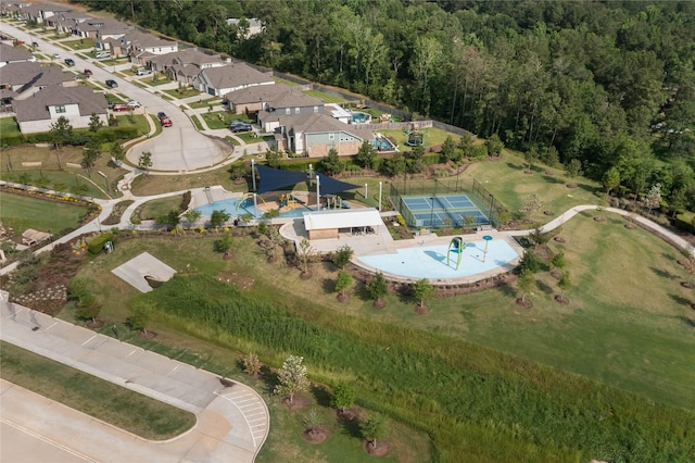 1226 Tilia Creek Ln, Montgomery, TX 77316 - aerial overview of property's location with nearby suburban area and a heavily wooded area