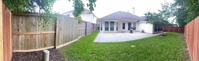 back of house featuring a patio area