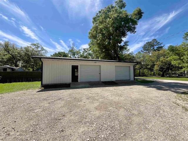 detached garage with fence