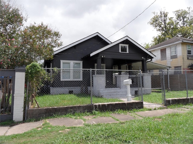bungalow with a fenced front yard