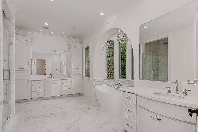 full bath featuring crown molding, a stall shower, and a sink