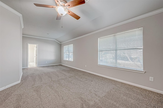 empty room featuring baseboards, ceiling fan, carpet flooring, and crown molding
