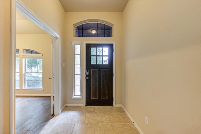 22526 Forbes Field Trl, Spring, TX 77389 - foyer entrance with a wealth of natural light, baseboards, and light tile patterned floors
