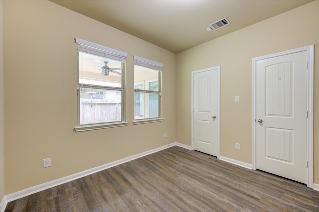 22526 Forbes Field Trl, Spring, TX 77389 - unfurnished room featuring baseboards, ceiling fan, visible vents, and dark wood-type flooring