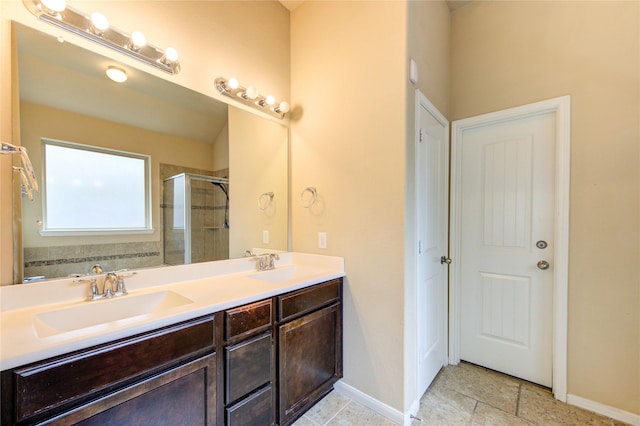 22526 Forbes Field Trl, Spring, TX 77389 - full bathroom with a sink, double vanity, a shower stall, and tile patterned floors