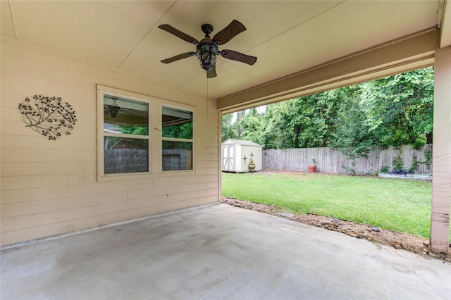 22526 Forbes Field Trl, Spring, TX 77389 - view of patio with ceiling fan, a storage shed, fence, and an outbuilding