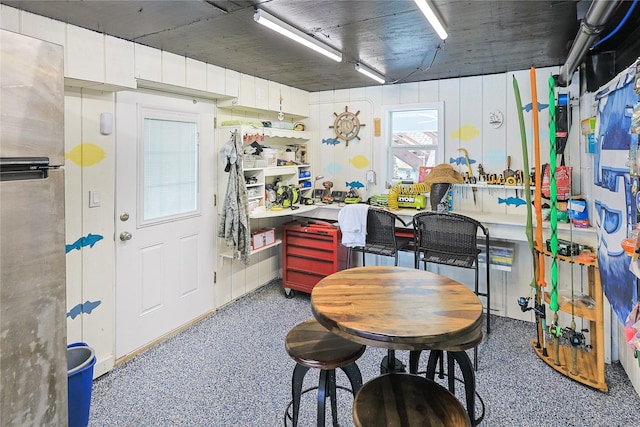 interior space featuring speckled floor