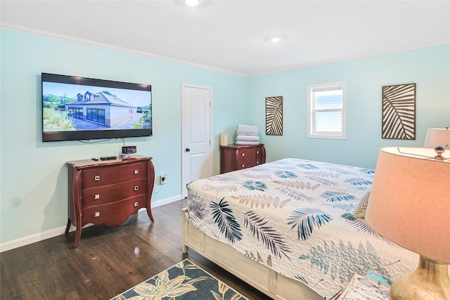 bedroom featuring ornamental molding, baseboards, recessed lighting, and wood finished floors