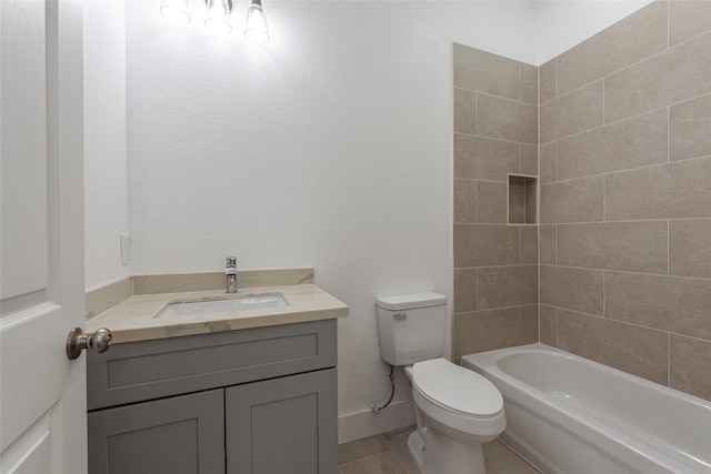 full bath with toilet, tile patterned floors, vanity, and bathtub / shower combination