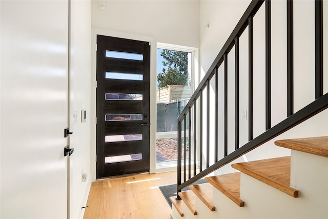 407 Grove St Unit B, Houston, TX 77020 - entryway featuring wood finished floors and stairway