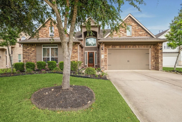 traditional-style house with brick siding, a front lawn, and an attached garage