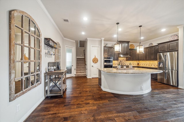 kitchen featuring stainless steel appliances, crown molding, dark brown cabinets, backsplash, and light stone countertops